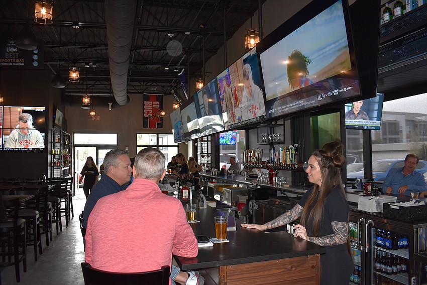 While it's a new building, the co-owners say this Ed's Tavern will have the same friendly atmosphere as the original Ed's Tavern at Main Street at Lakewood Ranch.