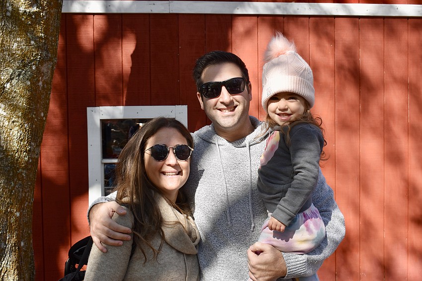 Samantha, Josh and Layla Goldman attend Temple Emanu-El's Strawberry Fields Shabbat at Hunsader Farms on Jan. 20.