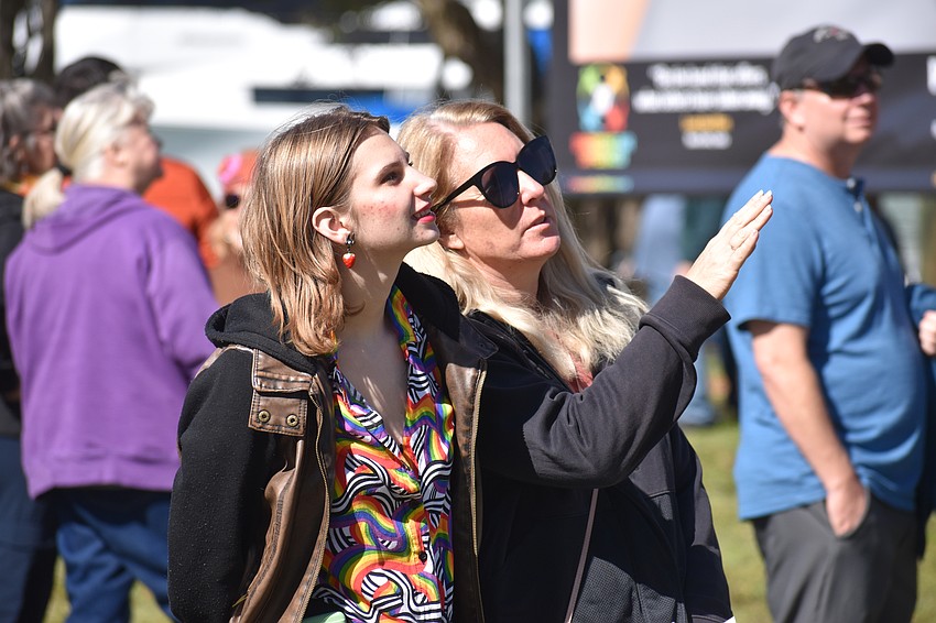 Grace Francis and Angie Francis view the artwork.