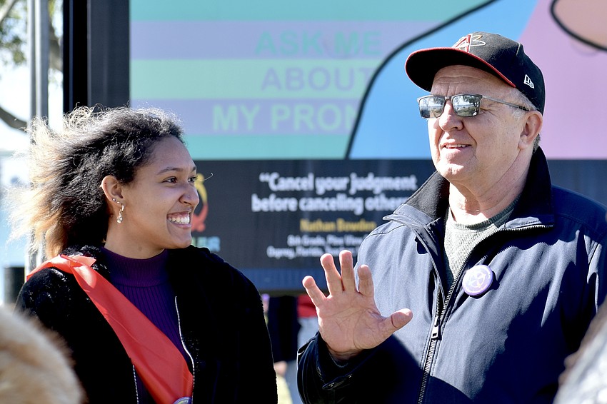 Aliciana Harvey-Lopez, a senior at Pine View School, talks with Pine View teacher Andy Vitkus at the site of her piece 