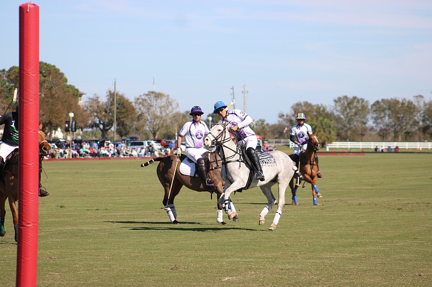 Glen Farm/Landhope's Martin Eddy fires a shot on goal as teammate Michael Bucklin looks on.