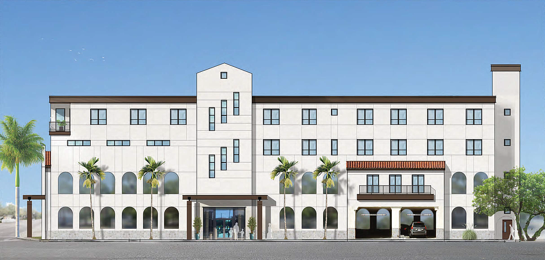 A building proposed at 1312 N. Tamiami Trail includes eight residential units on the top floor and one level of commercial space.