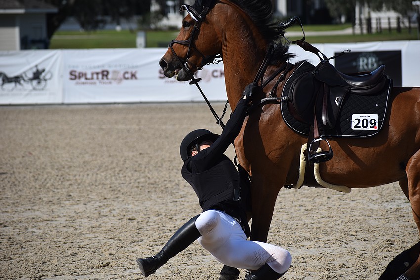 Maddison Stephen tries in vain to stay aboard Yalambis Ikon during the $100,000 Lugano Diamonds Grand Prix at TerraNova on Jan. 27.