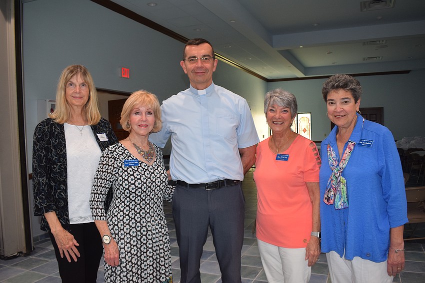 Terri Leonard, Susan Gilmore-Clarke, Father Robert Dziedziak, Mary Del Pup and Mary Ann Tomlinson