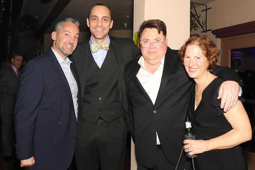 Patrick Duggan and Kevin Cooper with Dan and Laura DeLeo