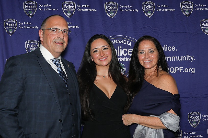 Sarasota Police Chief Rex Troche is celebrating the evening with his daughter, Adrianna, and wife, Kelly.