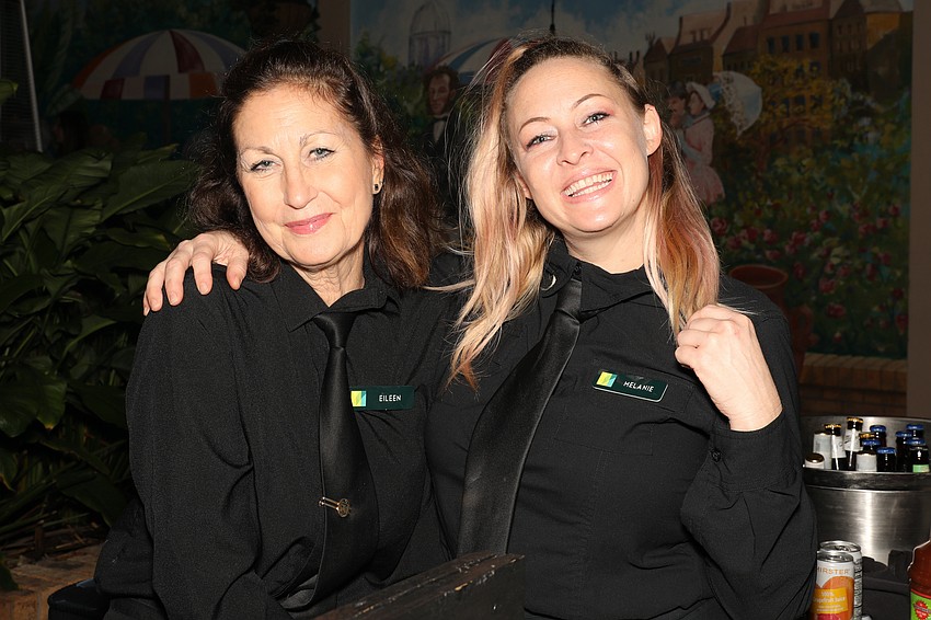 Serving - always with smiles - are Eileen McGrath and Melanie Osteen of Michael's On East.