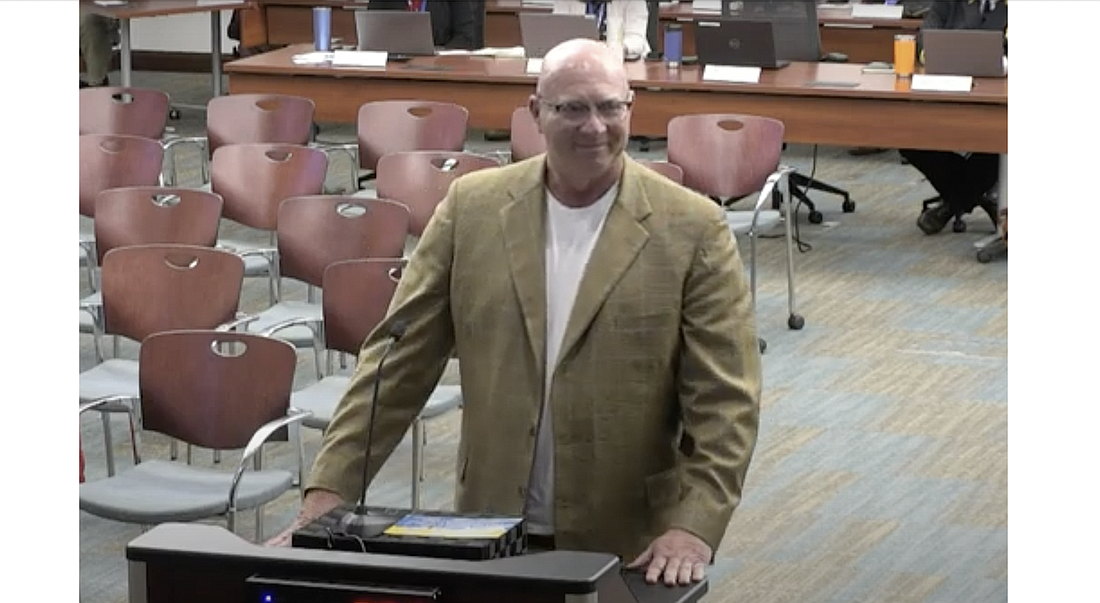 Jamie Bourdeau, co-owner of the Beach Front Grille, addresses the Palm Coast City Council about their new restaurant Loopers. Image from City Council livestream
