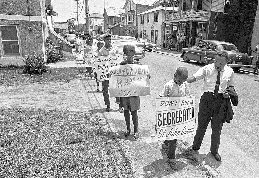 Civil rights leader Martin Luther King Jr. at a protest march in St. Augustine. King was arrested and appeared before U.S. District Court Judge Bryan Simpson in Jacksonville on June 13, 1964.