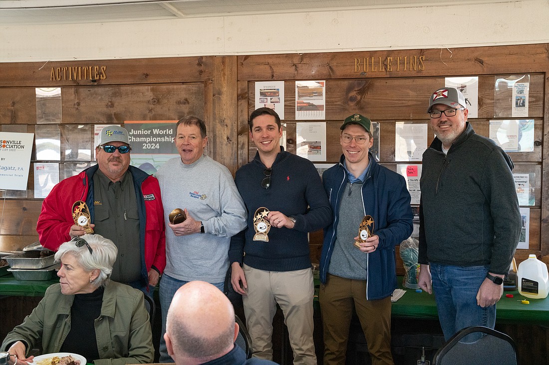 From left, the first-place Foley & Lardner clay target team Chip Bozeman, Jon Tucker, Jay Ritter and JD Fox with Jacksonville Bar Association Executive Director Craig Shoup.