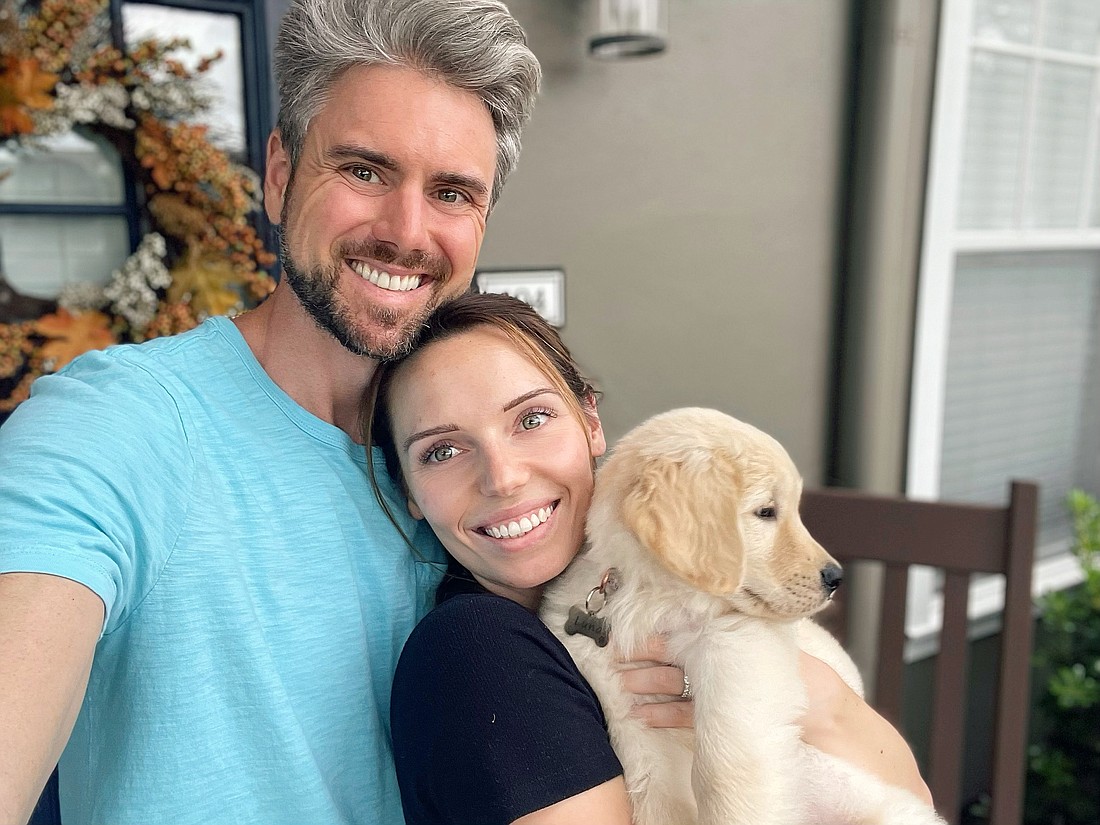 Josh and Danielle Miller with their dog Luna.