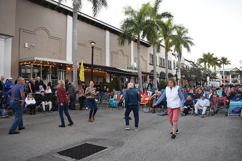 People are up moving and grooving as Kettle of Fish performs.