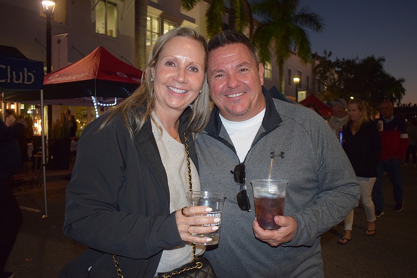 Sarasota's Heather Venetta takes in Music on Main for the first time while Sarasota's Dave Votaw attends regularly.