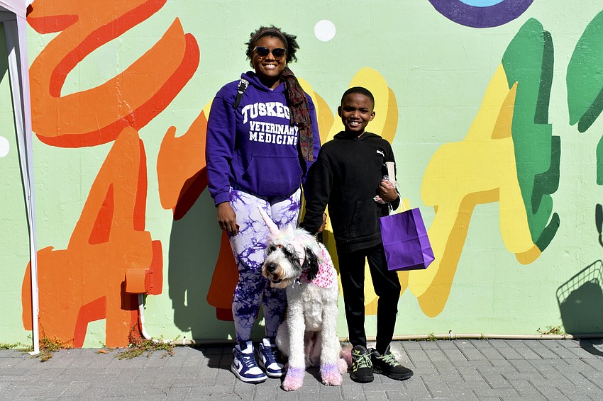 Costume contest Best in Show winners Dr. Donita McCants, Axel Rose, and Stephen Rose, 10. McCants's mobile veterinarian service, Veterinary Concierge Services, will soon serve the Sarasota area.