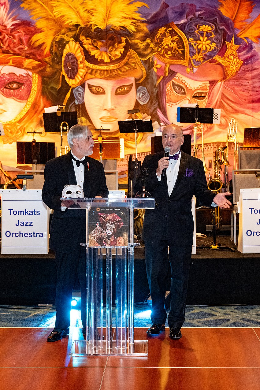 Victor DeRenzi and Richard Russell welcome guests.