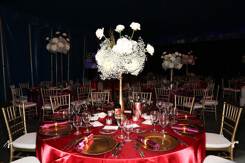 Thirty-five tables seating ten guests each were decorated with circus themed flair, and fresh flower centerpieces.