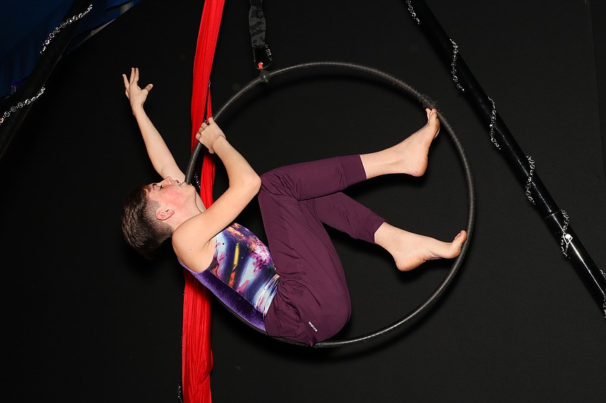 Dylan Mason performs on the lyra.