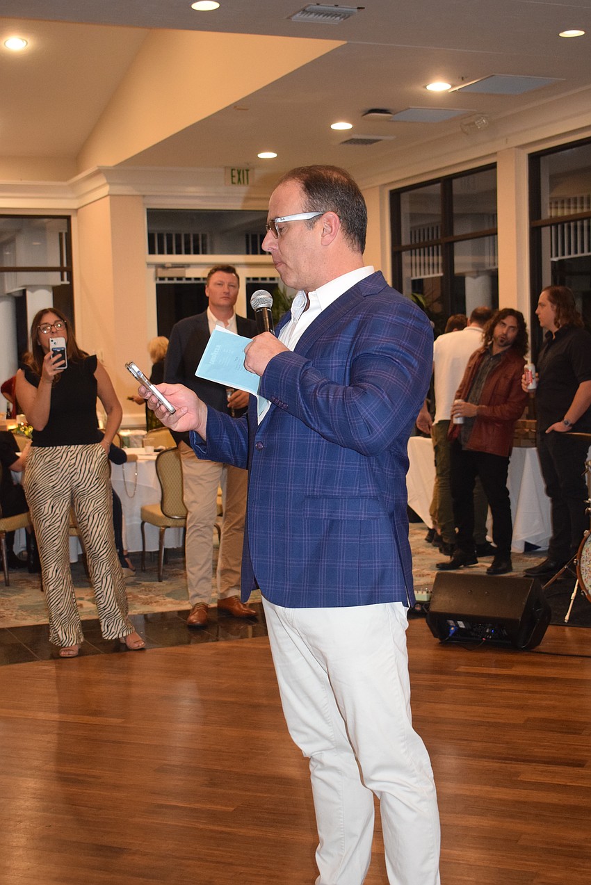 Buddy Foy of the Chateau Anna Maria emceed Taste and Tunes of the Key.