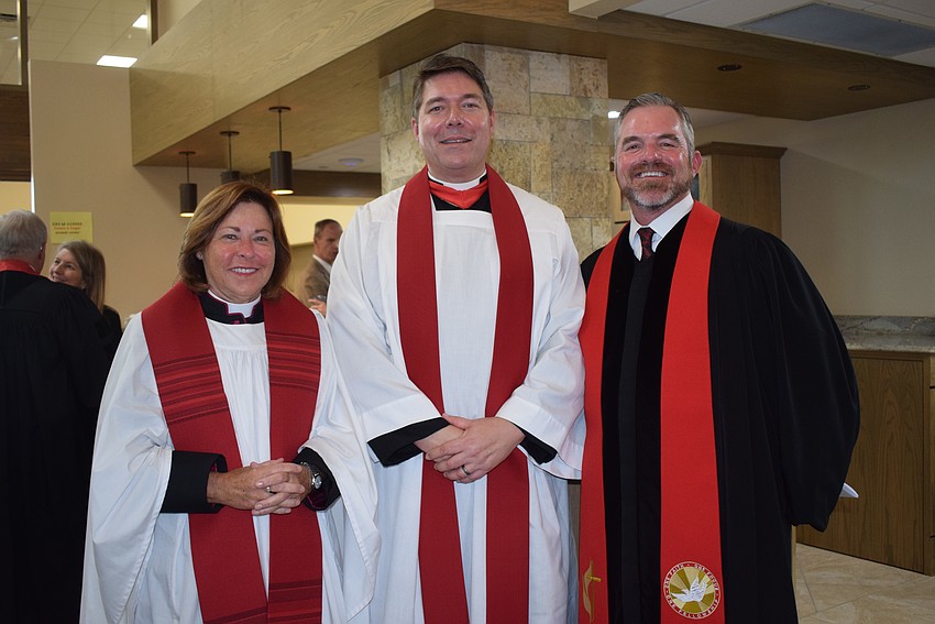 The Rev. Nancy Deming, the Rev. David Marshall and the Rev. Brock Patterson