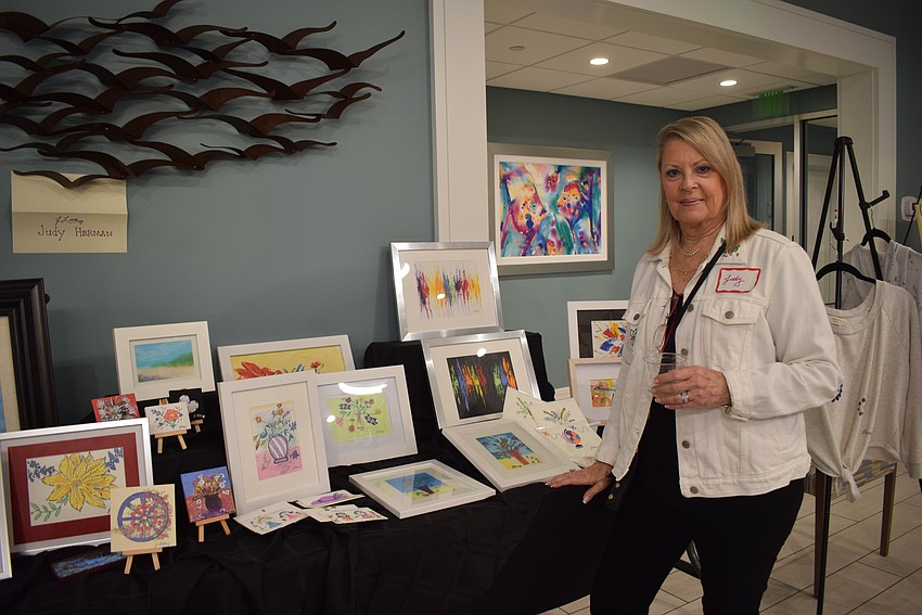 Judy Herman and her art at the Seaplace Condominiums Art Show on Feb. 4.