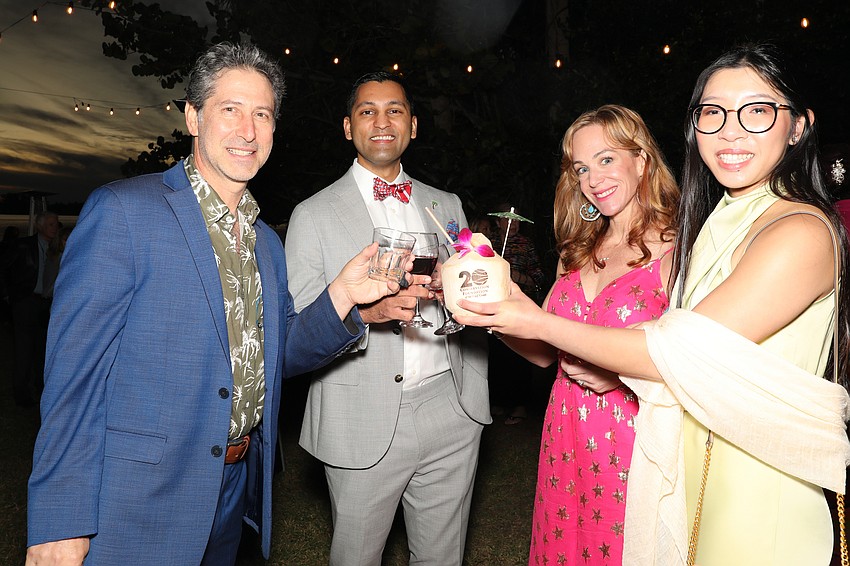 Justin Bloom, Tal Siddique, Summer Bloom and Kristen Truong toast to land conservation, which is the focus of this event.