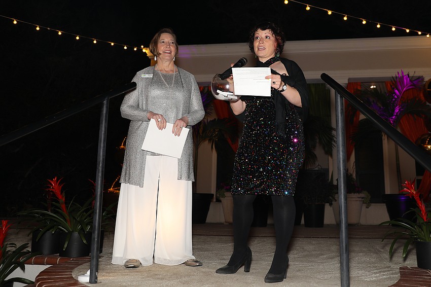 Christine Johnson and Sam Valentin speak to the guests about Conservation Foundation's commitments to land conservation.