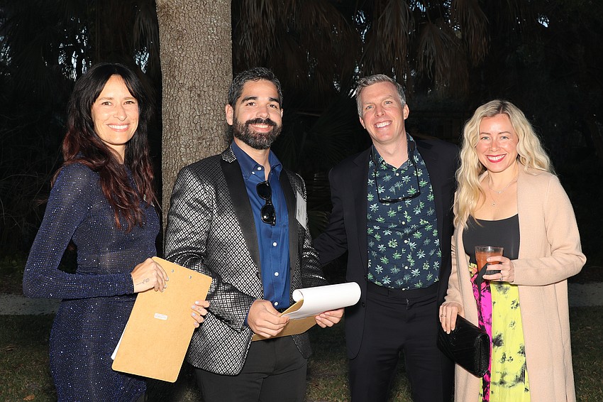 Jaime Goulet and Desmond Landry check-in Party in Paradise guests Josh and Caroline Weiner.