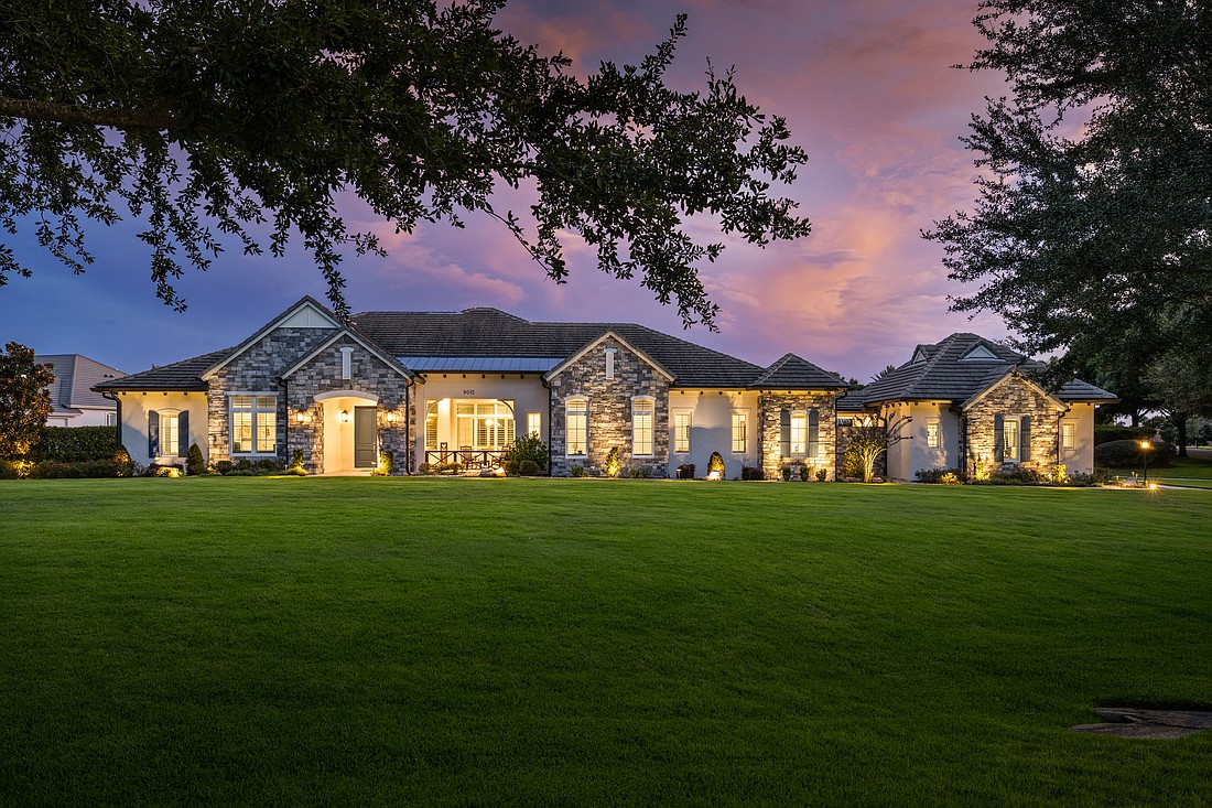 The home at 9012 Pinnacle Circle, Windermere, sold Jan. 31, for $1,895,000. This newly construct home is situated on a 1-acre lot in the gated community of Lake Down Crest The sellers were represented by Chris Christensen, Compass Florida LLC.