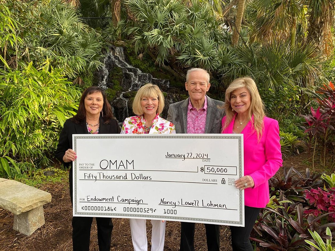 OMAM Board President Audrey Butler, Nancy & Lowell Lohman, and OMAM Immediate Past President Sherry Gailey. Courtesy photo