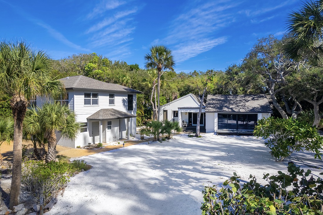 The main house at 854 N. Casey Key Road was built in 1975 and has 2,278 square feet of living area. The guest house was built in 2002 and has 1,184 square feet of living area.