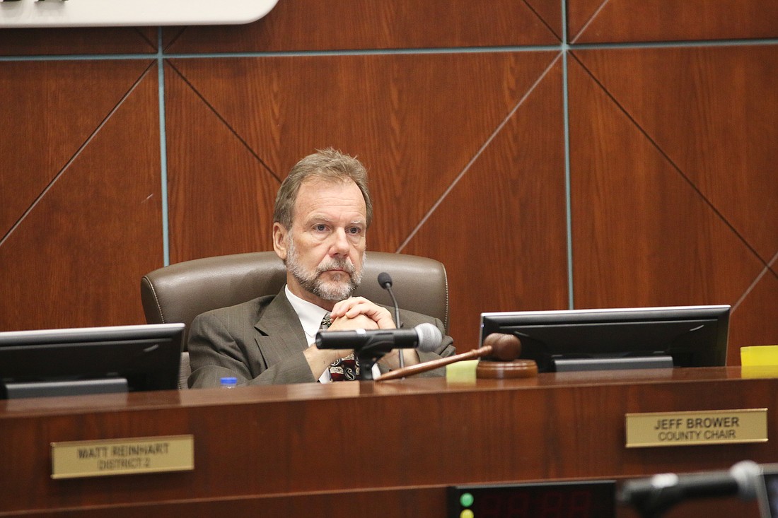 Volusia County Council Chair Jeff Brower listens to citizens during a Feb. 6 meeting. Photo by Jarleene Almenas