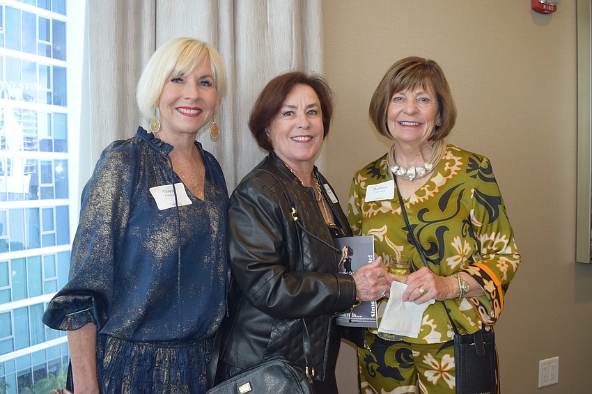 University Park's Teresa Simmons, Maureen Gibson and Barbara Kowalyk can't wait for the fashion show to begin. 