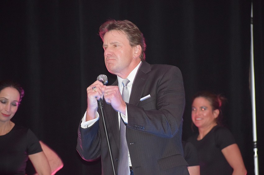 University Park's Bart Schubert takes on the personality of Robert Palmer during his lip-synch performance of 
