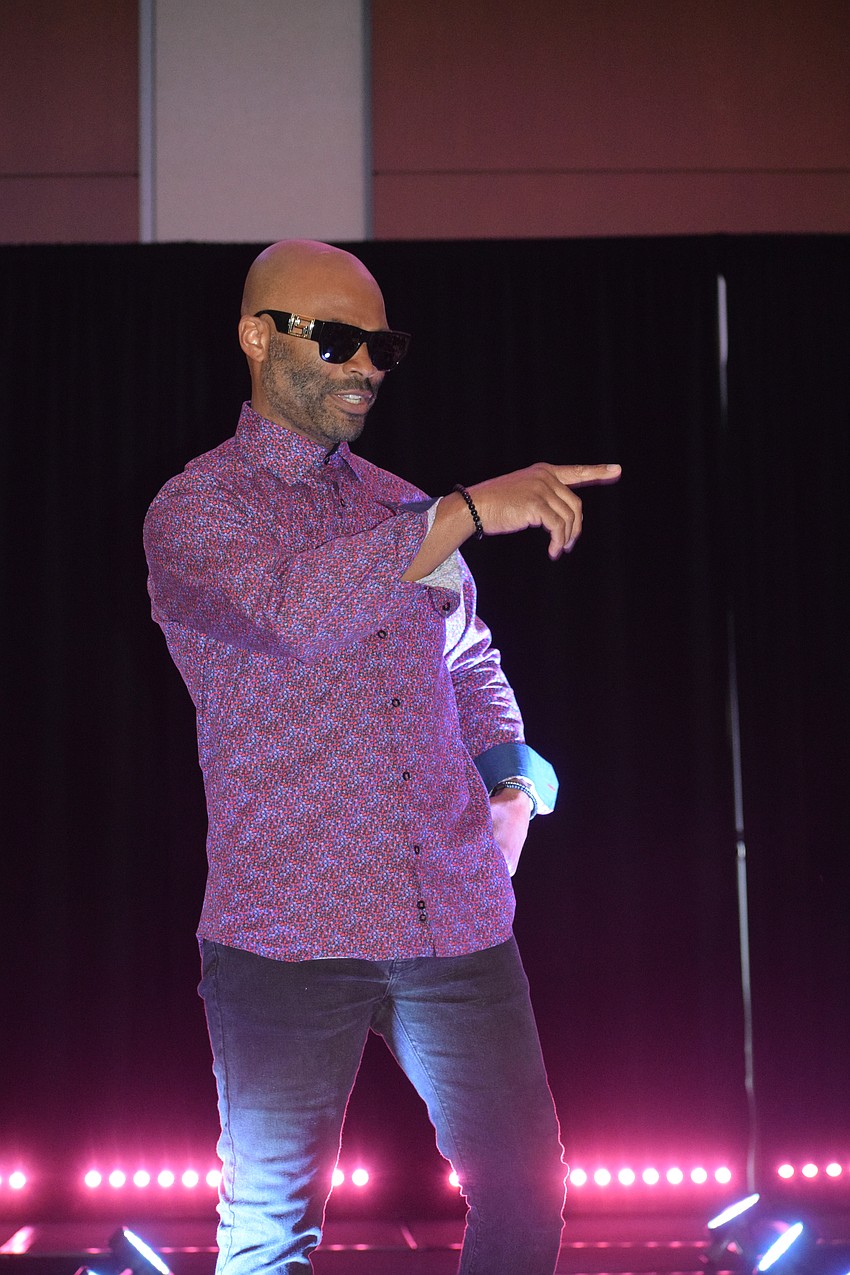 Rodrick Miller points to his friends in the crowd.