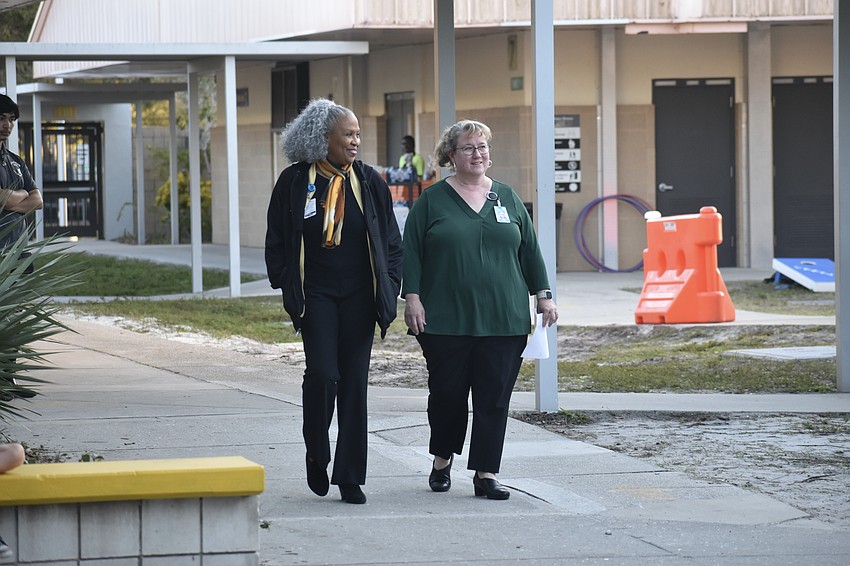 Harriet Moore, director of strategic engagement and Sara Dan, director of Food and Nutrition Services, enjoy the scene.