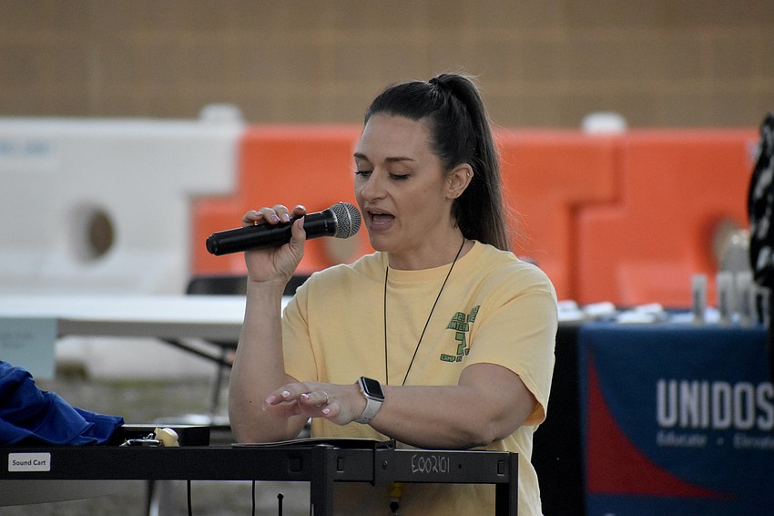 Lauren Piatt makes an announcement.