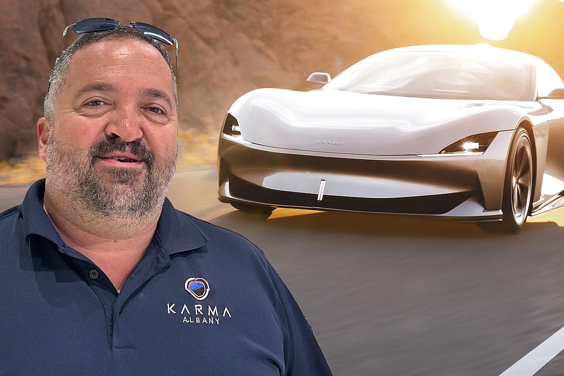 Karma Automotive Dealer Principal Vladimir “Val” Ranguelov and the "ultra-luxury” Kaveya. Ranguelov is opening a dealership in Jacksonville.