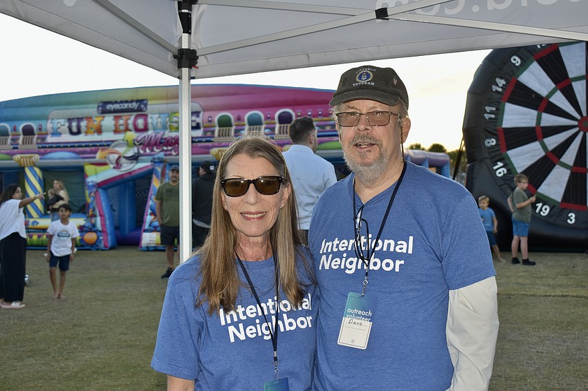 Nancy and Dave Rocks hand out candy and waters at one of the Grace Community Church tents.