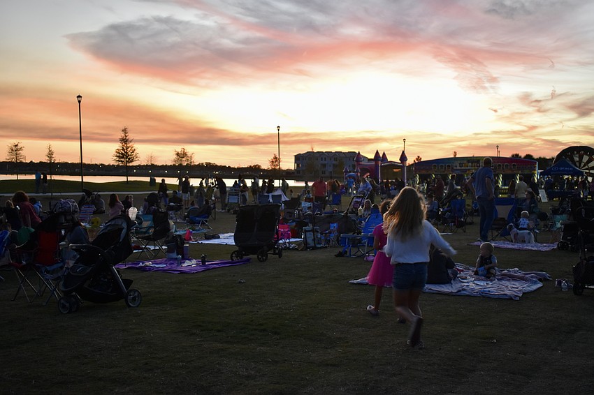 Hundreds of people attend Movie in the Park at Waterside Place on Feb. 9.