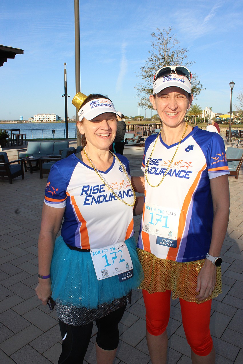 Sarasota's Sabrina Scrivanich and Joan Scrivanich showed their Mardi Gras spirit before the race.