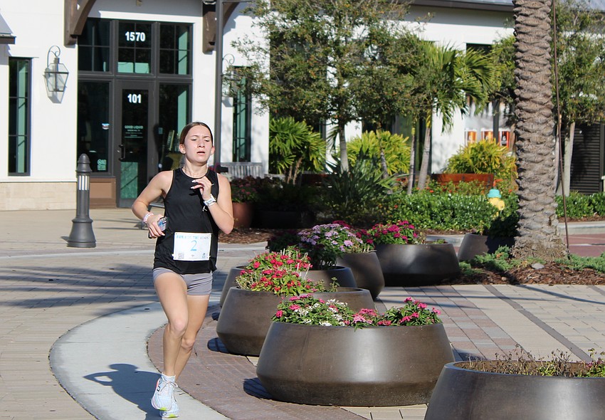 Lakewood Ranch's Rosemary Selke, a junior at Cardinal Mooney High, was the top female finisher in Run for the Beads.