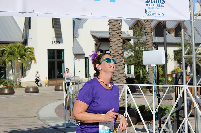 Waterlefe's Mary Cooke looks relieved to finish. 