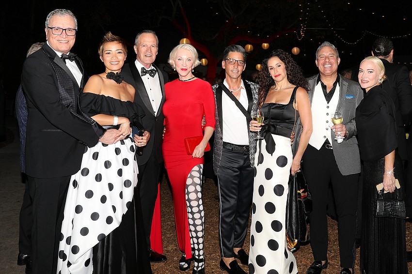 Greg and Belle Stikeleather, Curtis Jordan, Paige Petersen, Paulo Davis, Marnie and Steven Grossman, and Charley LeGrande show off their polka-dots.