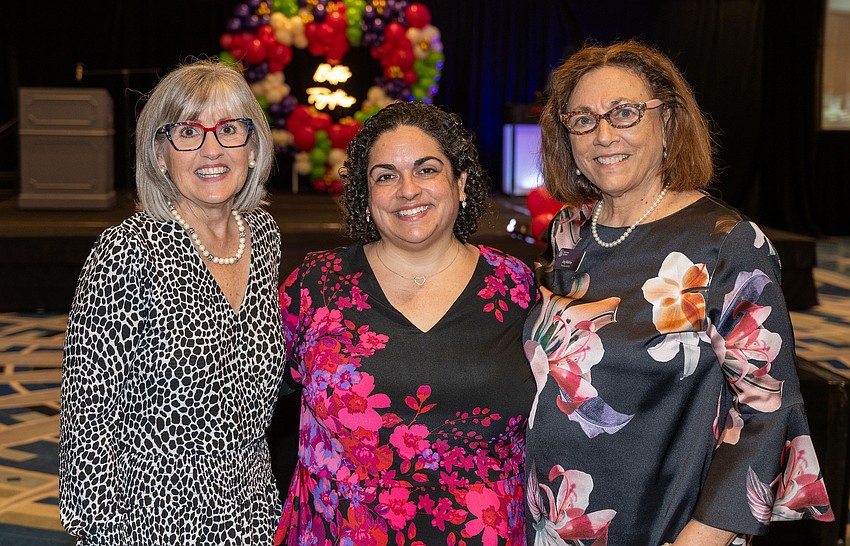VP of Marketing Gina Taylor, Events Director Jennifer Simms and President and CEO Joy Mahler