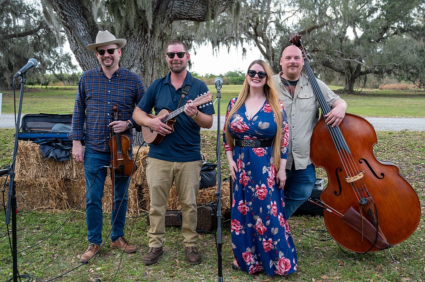 Apple Butter, the blue grass band, entertained guests.