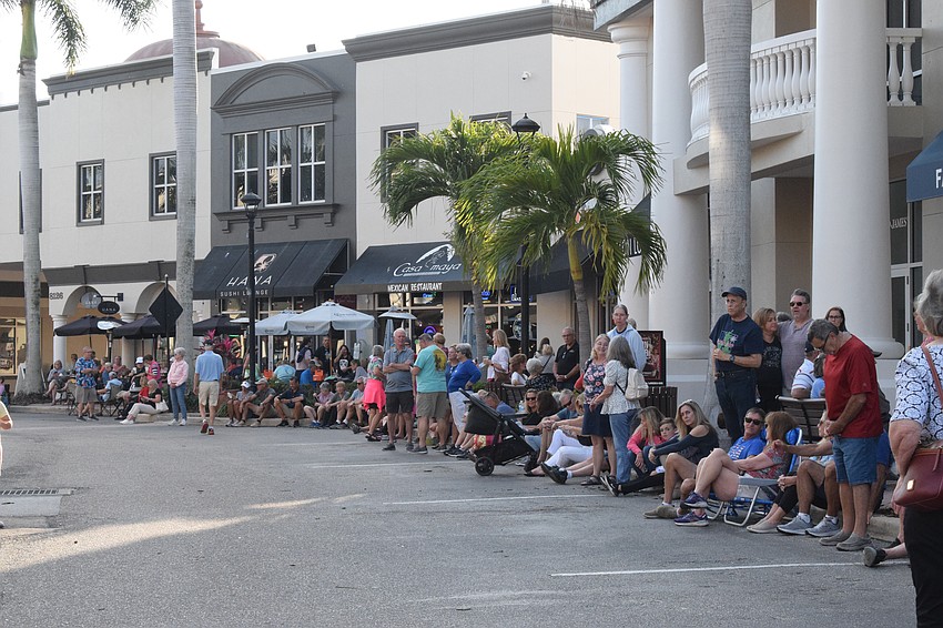People line the sidewalks of Main Street at Lakewood Ranch to prepare for the Clysdales' appeaance Feb. 15.