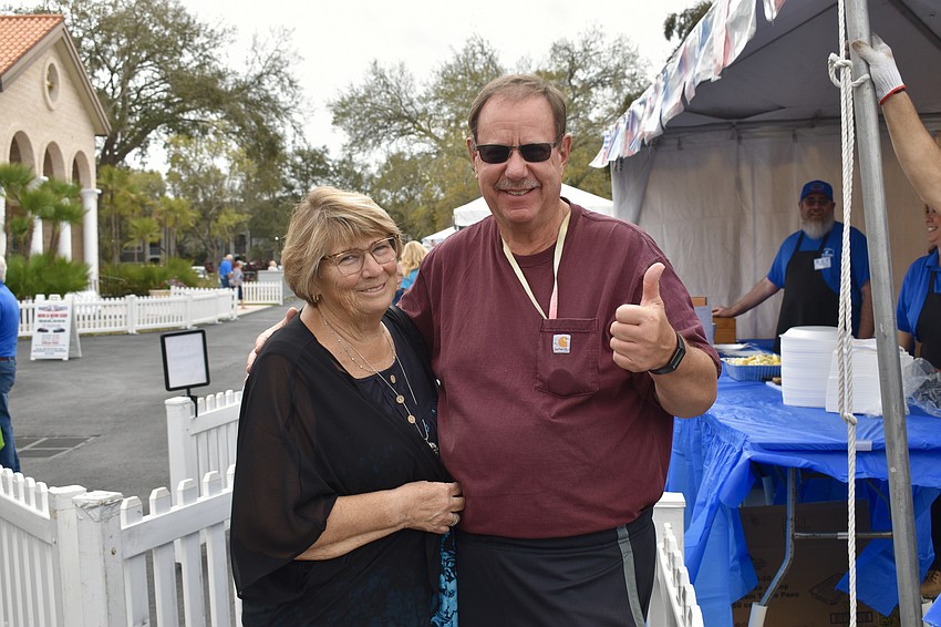 Terri and Gary Graham are Bradenton snowbirds from Indiana. They saw the signs for a Greek festival and pulled over for saganaki.