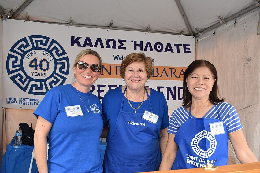 Tiffany Stonis, Paree Gardener and Lin Runge volunteer at check-in.