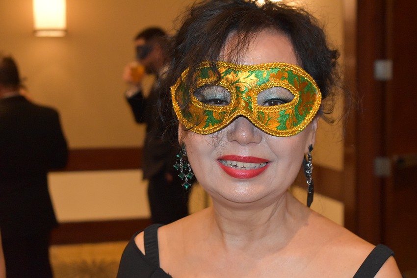 Sisterhood for Good member Kathy Yu brought a multi-colored mask to wear at Phantom.