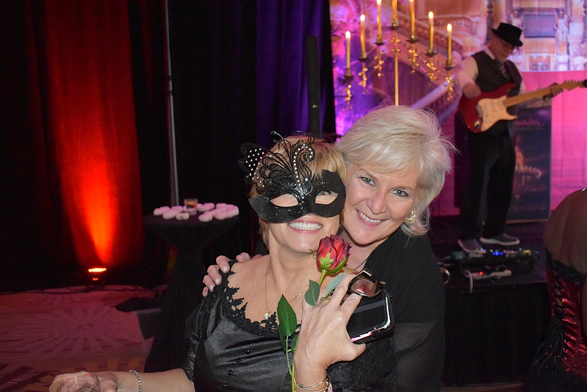 Two of East County's most philanthropic women, Angela Massaro-Fain and Maribeth Phillips enjoy the event.